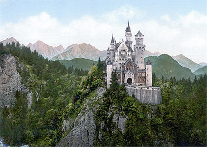 gray and brown concrete palace near cliff thumbnail