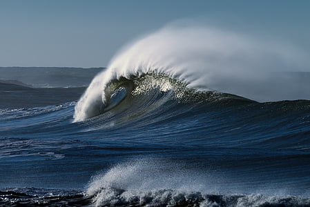 waves under cloudy sky thumbnail