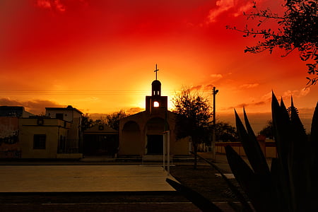 silhouette of church during sunset thumbnail