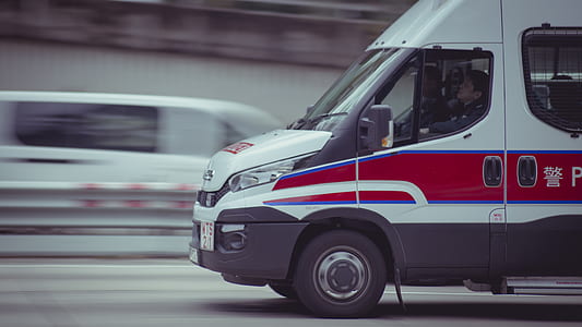 tanning photography of ambulance on road thumbnail