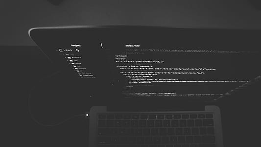 MacBook Pro displaying source code of software thumbnail