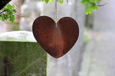 selective focus photography of red heart hanging decor thumbnail