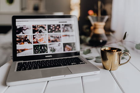 Apple MacBook & Coffee on the white desk thumbnail