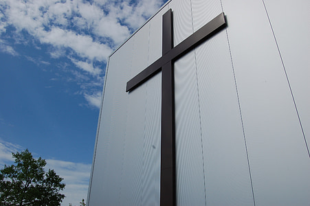 low angle photography of cross statue thumbnail