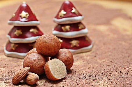 almonds beside pile of pastries thumbnail