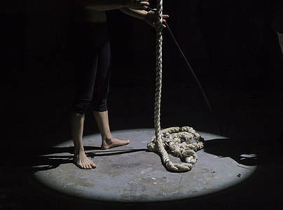 chiaroscuro photography of person holding beige riope thumbnail