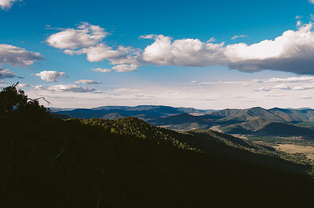 green mountain during day time thumbnail