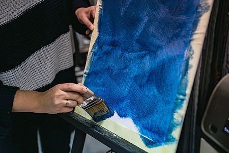 People painting on canvas thumbnail