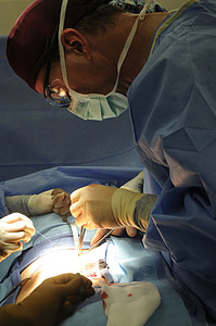 doctor performing surgery thumbnail