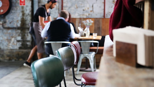 two black steel bar stools in shallow focus photography thumbnail