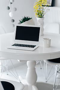 Workplace with laptop on table at home thumbnail