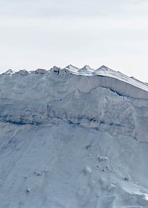 snow covered on mountain during daytime thumbnail