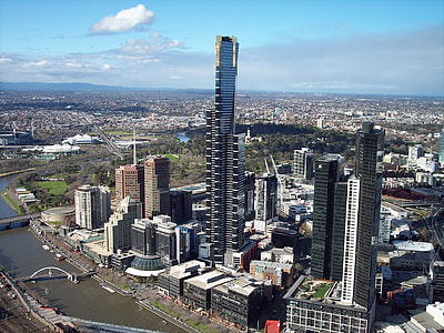 aerial photo of black and grey high rise building at daytime thumbnail