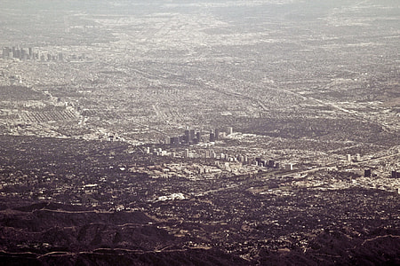 top view of buildings near mountains thumbnail