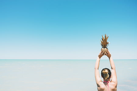 woman lifting fruit thumbnail