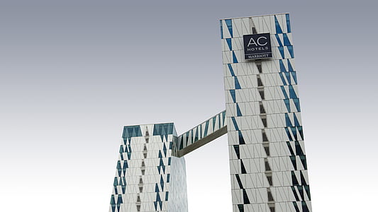 AC Hotel under white sky at daytime thumbnail