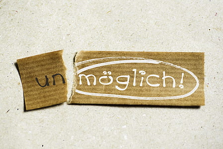 brown textile with Un moglick! text thumbnail