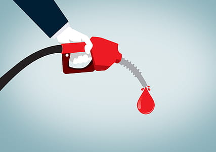Hand Holding Red Nozzle Pumping Gas - Fossil Fuel - Oil and Petrol thumbnail