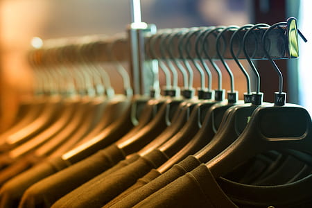 inline of hanging black shirt inside room thumbnail