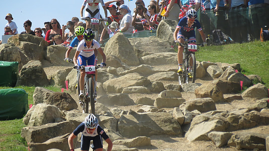 people riding bicycle on rocks thumbnail