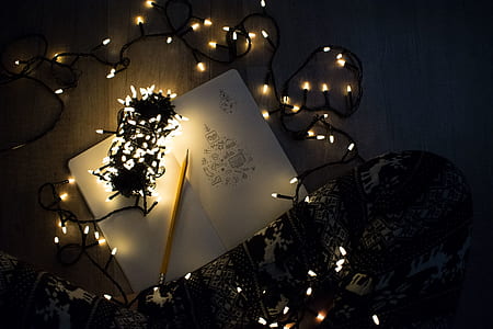 turned on string lights on book thumbnail