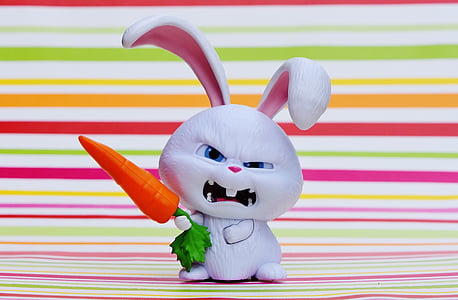rabbit holding carrot figurine thumbnail