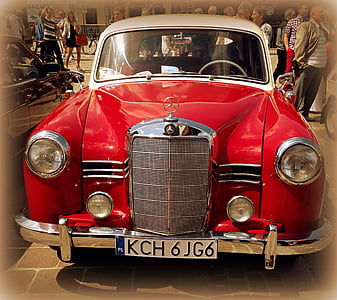 red Mercedes-Benz vehicle on brown surface thumbnail