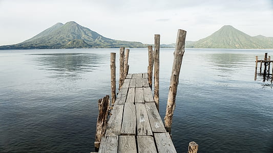dock beside body of water thumbnail
