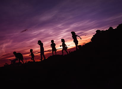 silhouette of six children during sunset thumbnail