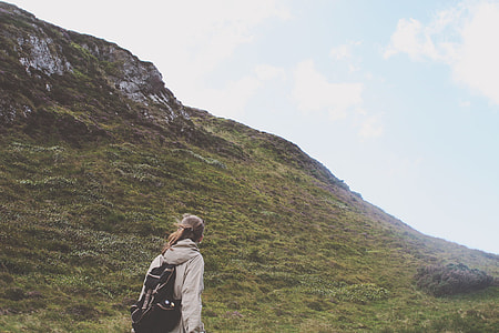woman walking on green grass thumbnail