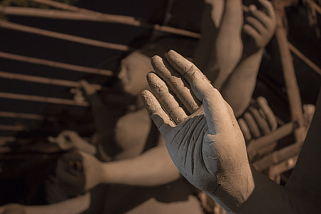 closeup photo of hand statue thumbnail