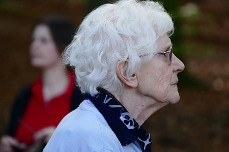 close-up photography of woman wearing blue collared top thumbnail