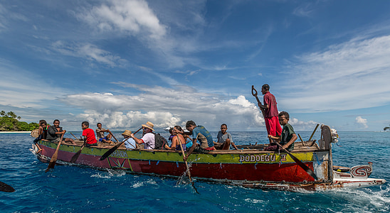 people riding a boat on sea thumbnail