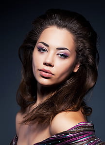 portait photo of woman in purple top thumbnail