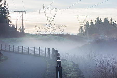 fog on curved road during day time thumbnail