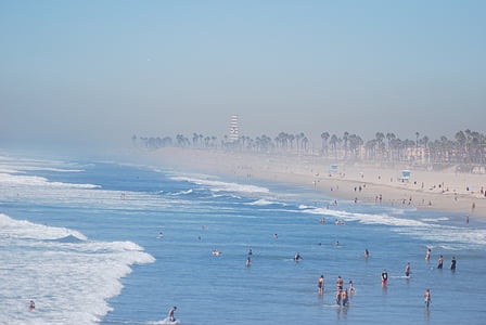 bird's-eye view of people on beach thumbnail