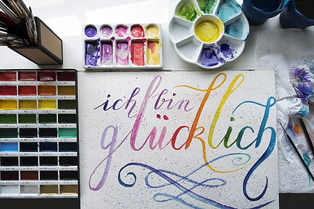 flat lay photography of water colors thumbnail