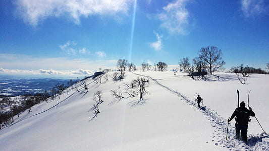 person on snow covered mountain thumbnail