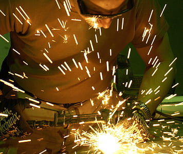 man using welder thumbnail