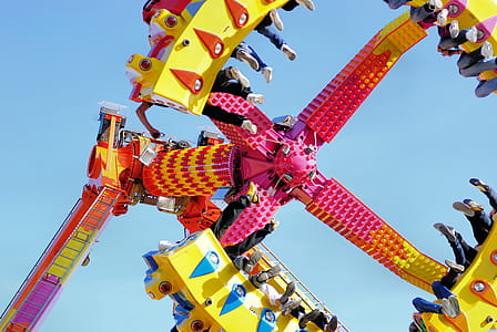 People Riding a Swing in the Amusement Park thumbnail