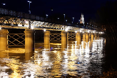 lighted bridge during nighttime thumbnail