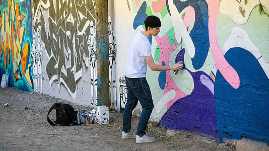 man doing some graffiti art thumbnail