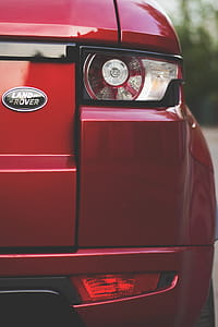 Red Land Rover Headlight thumbnail