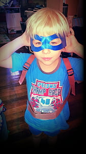 boy in blue shirt and mask thumbnail