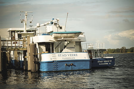 white and blue boat thumbnail