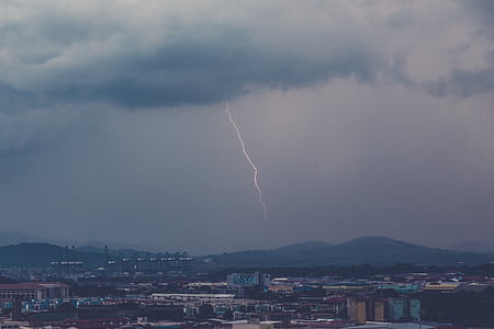 aerial photo of lightning and high rise buildings thumbnail