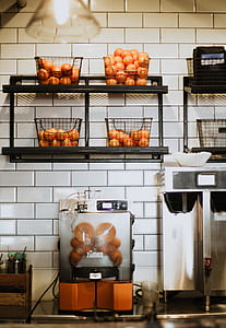 basket of orange on metal wall rack thumbnail
