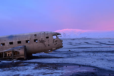 broken airplane on body of water thumbnail