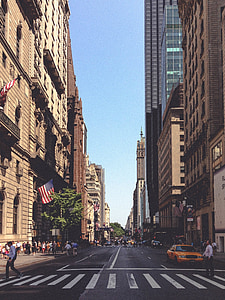 man walking on pedestrian lane during daytime thumbnail
