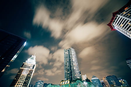 lowangle photo of city at nighttime thumbnail